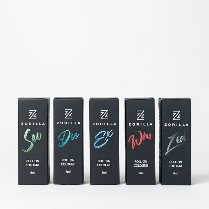 Five Zorilla cologne boxes arranged in a row on a gray surface.